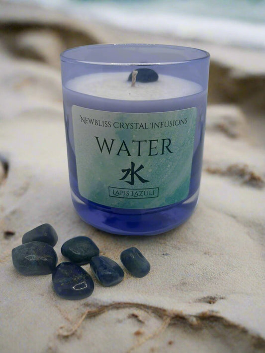 Crystal infused candle on a beach~ water element